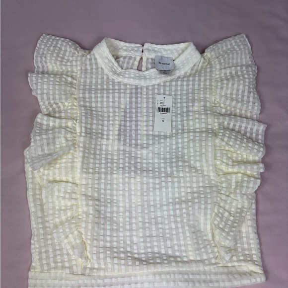 Anthropologie Tops - Anthropologie Cream Ruffle Blouse